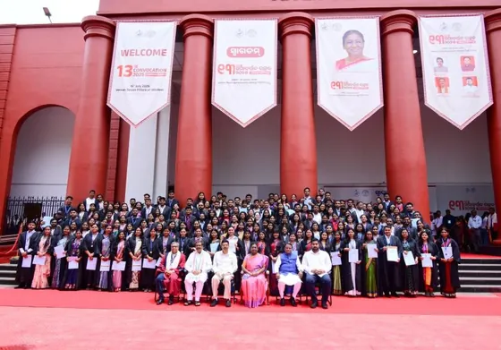 Medal recipients with the chief guests at Ravenshaw University's 13th convocation