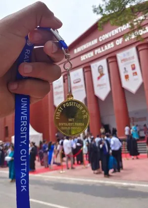 The first-position M.Sc. IT gold medal, engraved with my name, outside the convocation venue